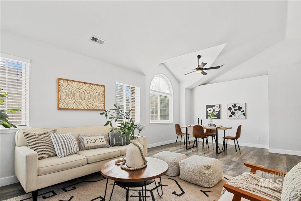 5134 S Surprise Way Unit 206, Boise, ID 83716 - living room with ceiling fan, wood finished floors, and vaulted ceiling