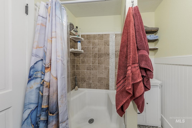 bathroom featuring walk in shower