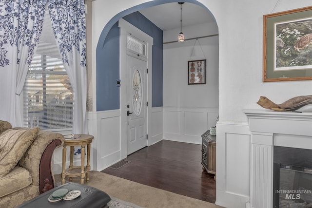 foyer with dark hardwood / wood-style flooring