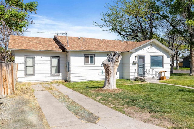 view of front of property with roof with shingles