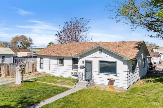view of front of home with a shingled roof