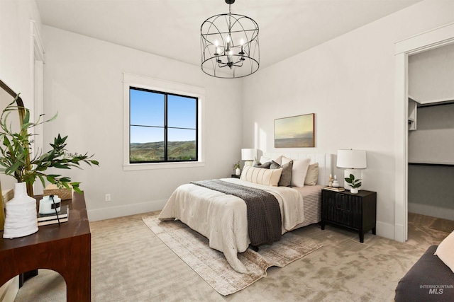 11473 N 17th Way, Boise, ID 83714 - bedroom with a chandelier, light colored carpet, and baseboards