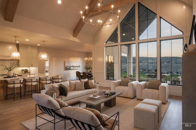 11473 N 17th Way, Boise, ID 83714 - living area featuring a chandelier, high vaulted ceiling, light wood-type flooring, beam ceiling, and recessed lighting