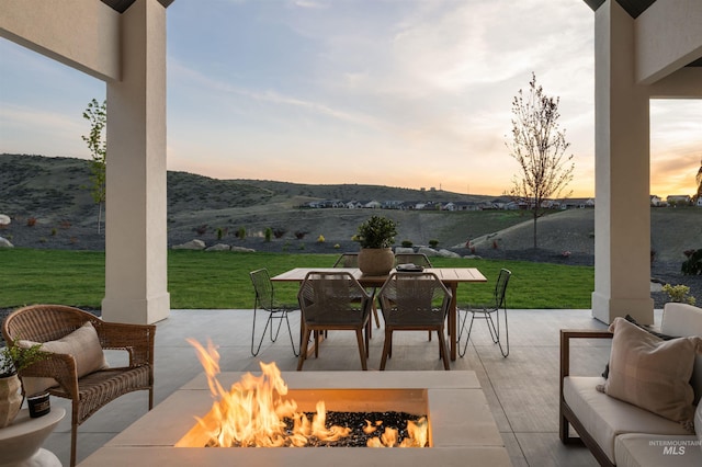 11473 N 17th Way, Boise, ID 83714 - view of patio / terrace with an outdoor living space with a fire pit, outdoor dining area, and a mountain view