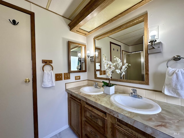 bathroom with decorative backsplash and vanity