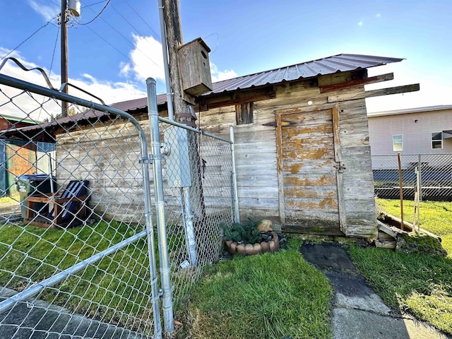 exterior space featuring an outbuilding