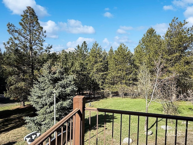 deck featuring a lawn