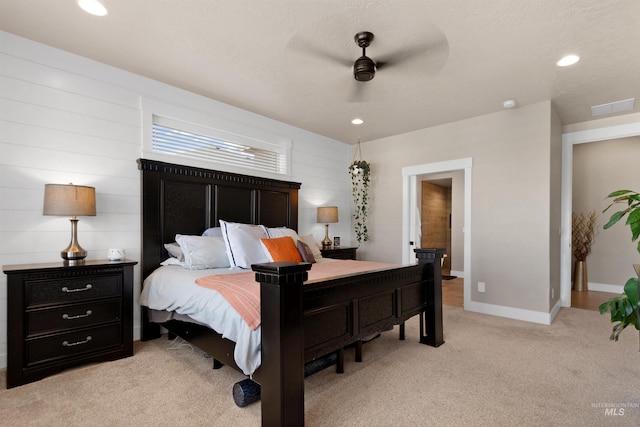 bedroom with recessed lighting, light carpet, a ceiling fan, baseboards, and visible vents