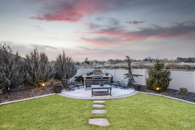 view of yard featuring a fenced backyard and a patio