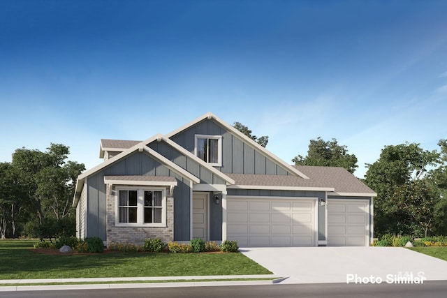 5543 E Bridal Veil Falls Dr, Nampa, ID 83686 - craftsman-style home with a garage, driveway, a front lawn, board and batten siding, and a shingled roof