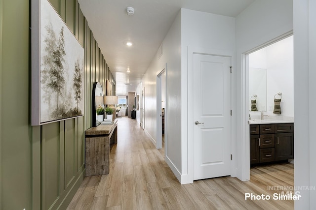 5543 E Bridal Veil Falls Dr, Nampa, ID 83686 - corridor featuring light wood-style flooring and baseboards