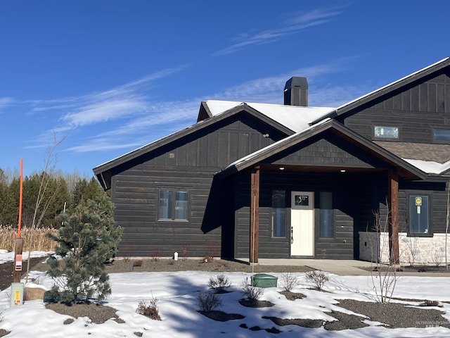 view of front of house with a chimney