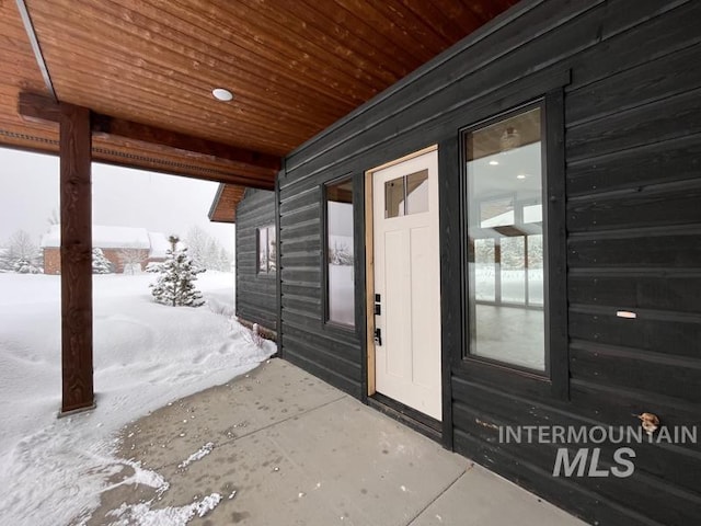 view of snow covered patio