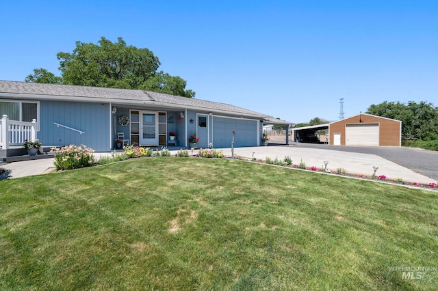 single story home featuring a front lawn, a carport, and a garage