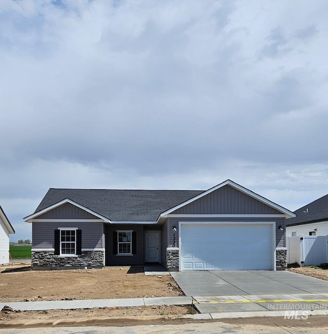 view of front of property with a garage