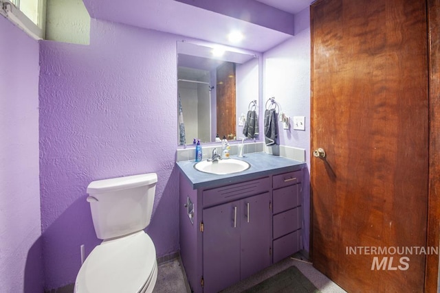 829 Diagonal, Clarkston, WA 99403 - bathroom featuring a textured wall and vanity