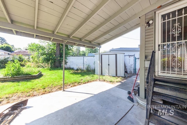 829 Diagonal, Clarkston, WA 99403 - fenced backyard with a patio, entry steps, and a storage shed