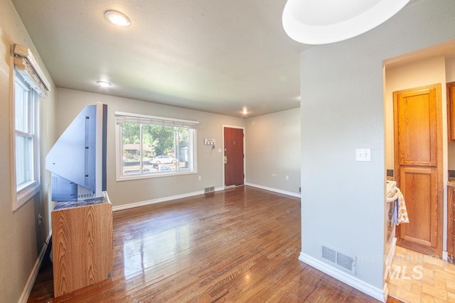 829 Diagonal, Clarkston, WA 99403 - empty room featuring wood finished floors and recessed lighting