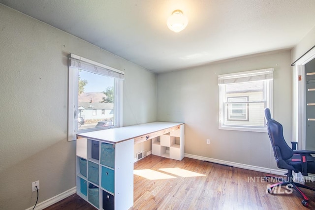 829 Diagonal, Clarkston, WA 99403 - office area featuring wood finished floors and baseboards