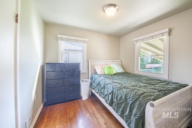 829 Diagonal, Clarkston, WA 99403 - bedroom with wood finished floors and multiple windows