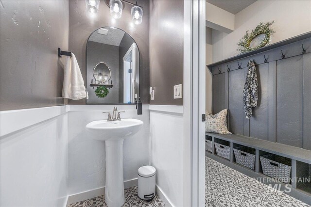bathroom with tile patterned flooring