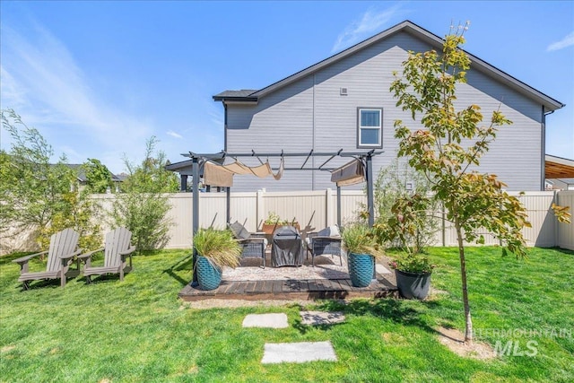 back of house featuring a pergola and a patio