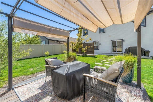 view of patio featuring a grill, a pergola, and an outdoor hangout area