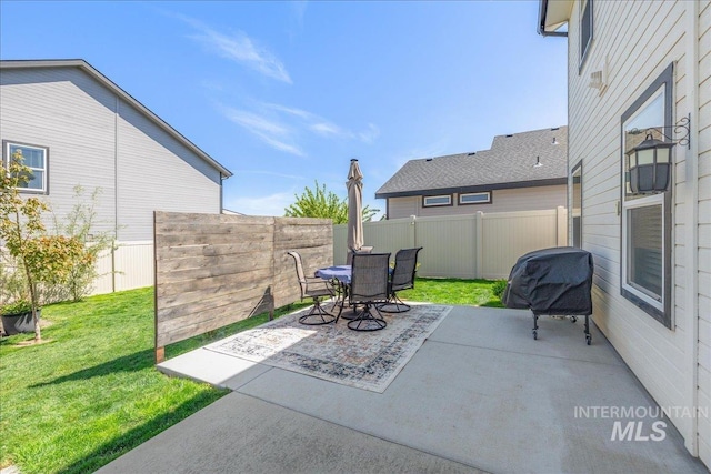 view of patio featuring outdoor dining space and grilling area