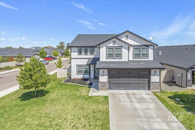 view of front of house with board and batten siding, concrete driveway, an attached garage, stone siding, and a shingled roof