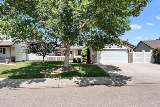 816 W Georgia Ave, Nampa, ID 83686 - view of property hidden behind natural elements featuring an attached garage, concrete driveway, brick siding, and central AC unit