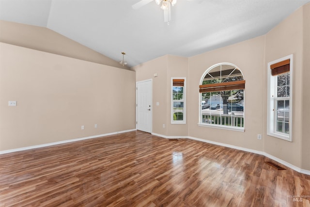 816 W Georgia Ave, Nampa, ID 83686 - unfurnished room with wood finished floors, lofted ceiling, ceiling fan, and baseboards