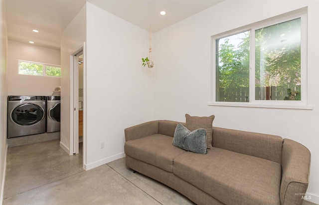 712 E Sheridan, Nampa, ID 83686 - living area with washing machine and dryer, finished concrete flooring, and recessed lighting