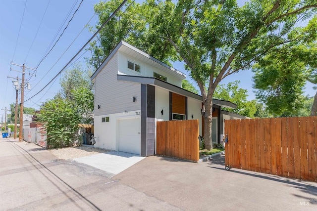712 E Sheridan, Nampa, ID 83686 - view of front facade with asphalt driveway and an attached garage