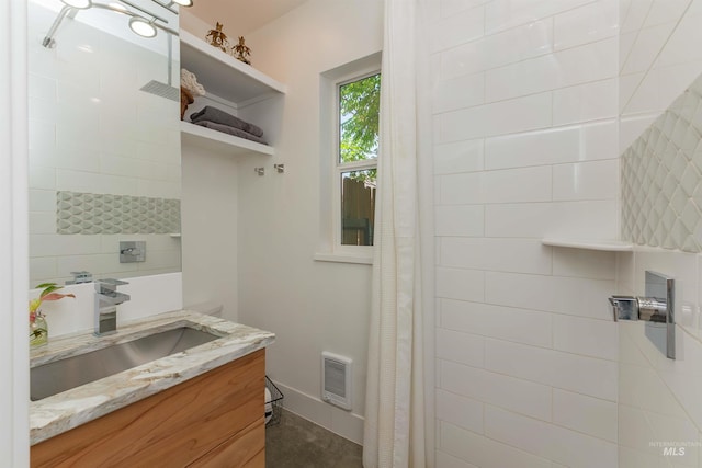 712 E Sheridan, Nampa, ID 83686 - full bathroom with vanity and a tile shower