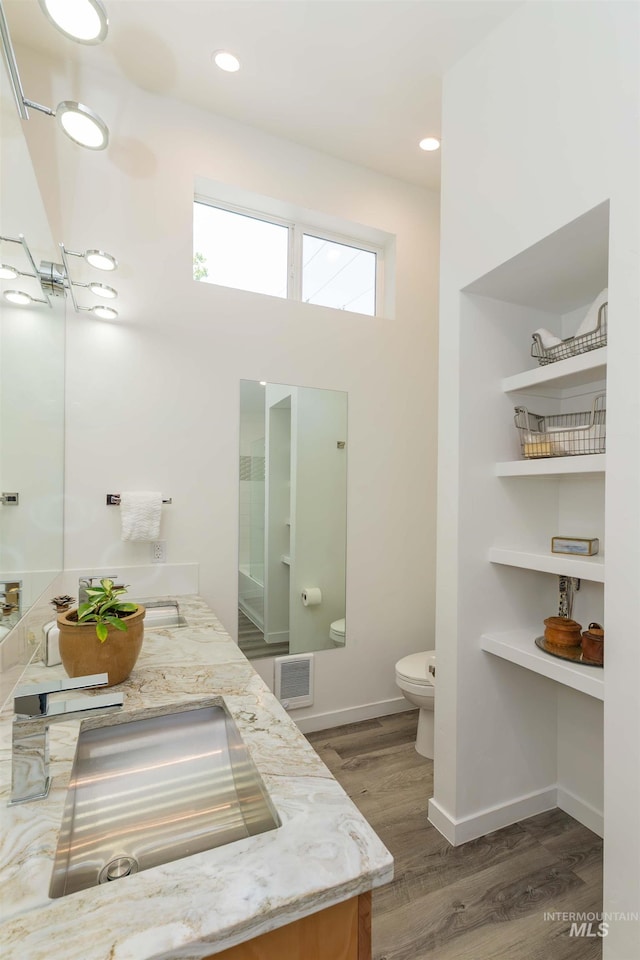 712 E Sheridan, Nampa, ID 83686 - full bath with wood finished floors and double vanity