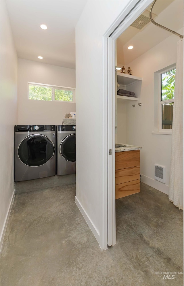 712 E Sheridan, Nampa, ID 83686 - laundry room with washing machine and dryer, healthy amount of natural light, and recessed lighting