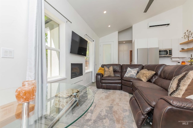 712 E Sheridan, Nampa, ID 83686 - living area with a wall mounted air conditioner, a glass covered fireplace, recessed lighting, and high vaulted ceiling