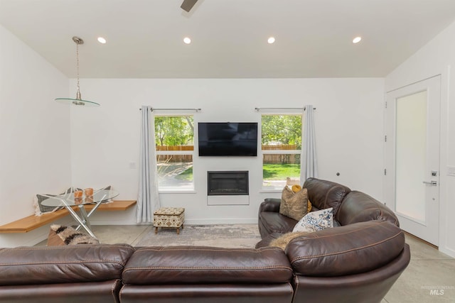 712 E Sheridan, Nampa, ID 83686 - living room featuring recessed lighting and a glass covered fireplace