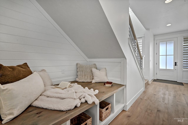 mudroom with recessed lighting, baseboards, and light wood-style floors