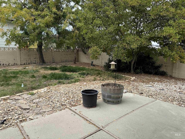 1111 SW 11th Ave, Ontario, OR 97914 - view of yard with a fenced backyard and a patio
