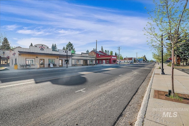 140 Jacks Loop, Donnelly, ID 83615 - view of asphalt road with sidewalks and curbs