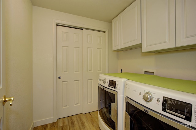 4420 N Ginzel St, Boise, ID 83703 - clothes washing area with cabinet space, baseboards, independent washer and dryer, and light wood-style floors