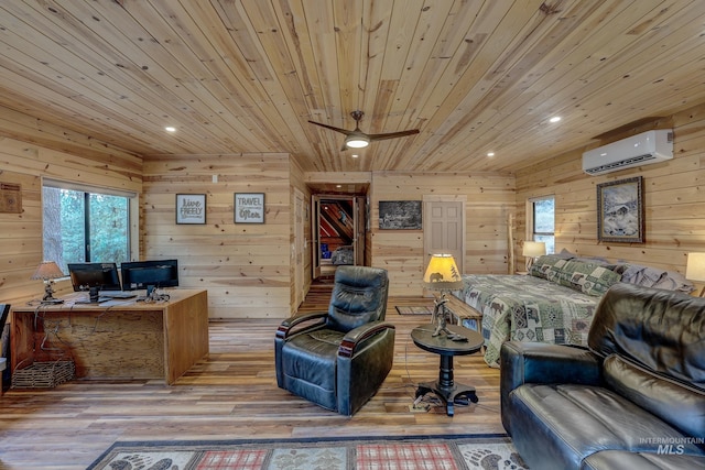 interior space featuring ceiling fan, wooden ceiling, light wood-type flooring, a wall mounted air conditioner, and wood walls