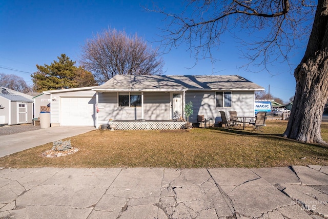 ranch-style house with a front yard, concrete driveway, and an attached garage