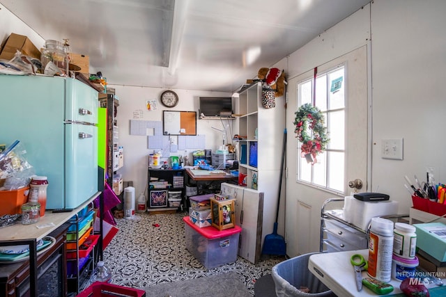 kitchen with freestanding refrigerator