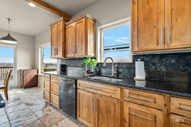 13331 Peaceful Way, Nampa, ID 83686 - kitchen featuring a sink, backsplash, dishwashing machine, and a wealth of natural light