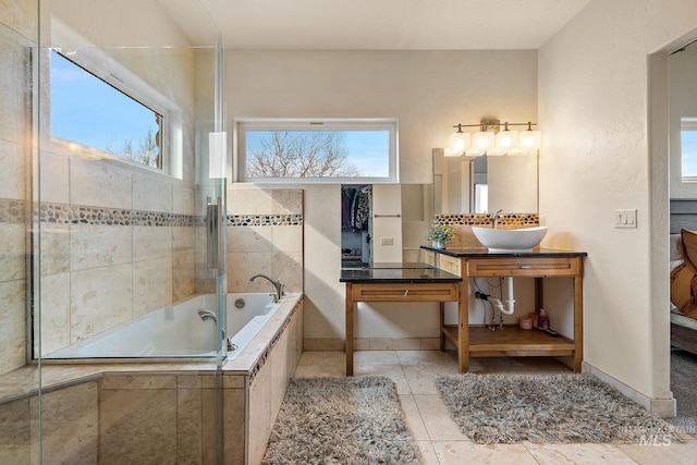 13331 Peaceful Way, Nampa, ID 83686 - bathroom featuring a sink, tile patterned floors, and a wealth of natural light