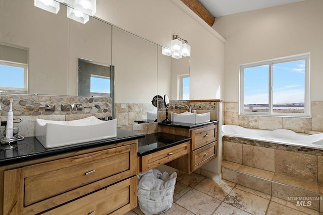 13331 Peaceful Way, Nampa, ID 83686 - bathroom with a healthy amount of sunlight, a garden tub, and vanity