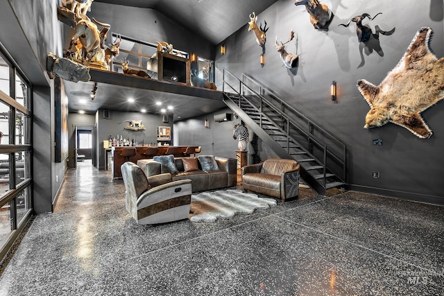 13331 Peaceful Way, Nampa, ID 83686 - living area with speckled floor, high vaulted ceiling, and stairway
