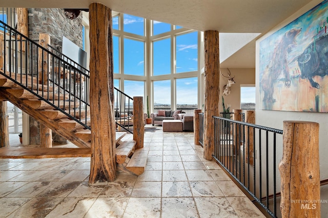 13331 Peaceful Way, Nampa, ID 83686 - living area featuring stairs and stone tile flooring